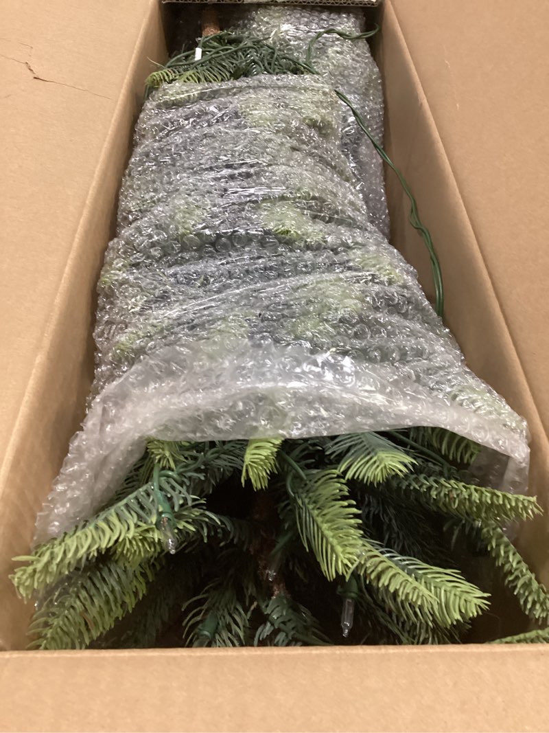Condition photo showing Good Condition for puleo international 4.5ft pre-lit aspen fir artificial christmas tree with 250 clear lights, 411 realistic dense branch tips, easy setup artificial trees with sturdy metal stand 4.5' aspen fir with 250 clear lights