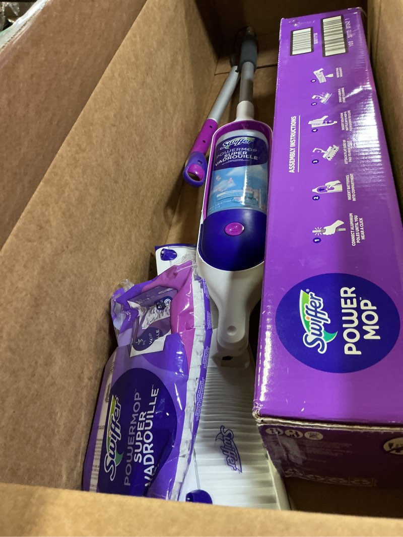 Condition photo showing Good Condition for swiffer powermop multi-surface mop kit for floor cleaning, includes powermop, 2 mopping pad refills, 1 cleaning solution with fresh scent and 2 batteries purple and white