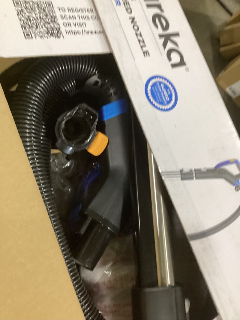 Condition photo showing As Is for eureka bagless canister vacuum with washable hepa filter, 16kpa suction for carpets/hard floors, compact design with 3 cleaning tools, 2-motor household vacuum, lightweight and easy maneuverable indigo blue