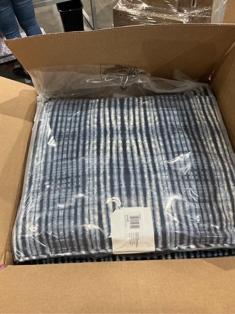 Condition photo showing New/Like New for arden outdoor deep seat cushion set, 24 in x 24 in, weather-proof, rain-proof, fade resistant patio cushion for chair, sofa, and couch blue shibori stripe polyfill blue shibori stripe 1 pack