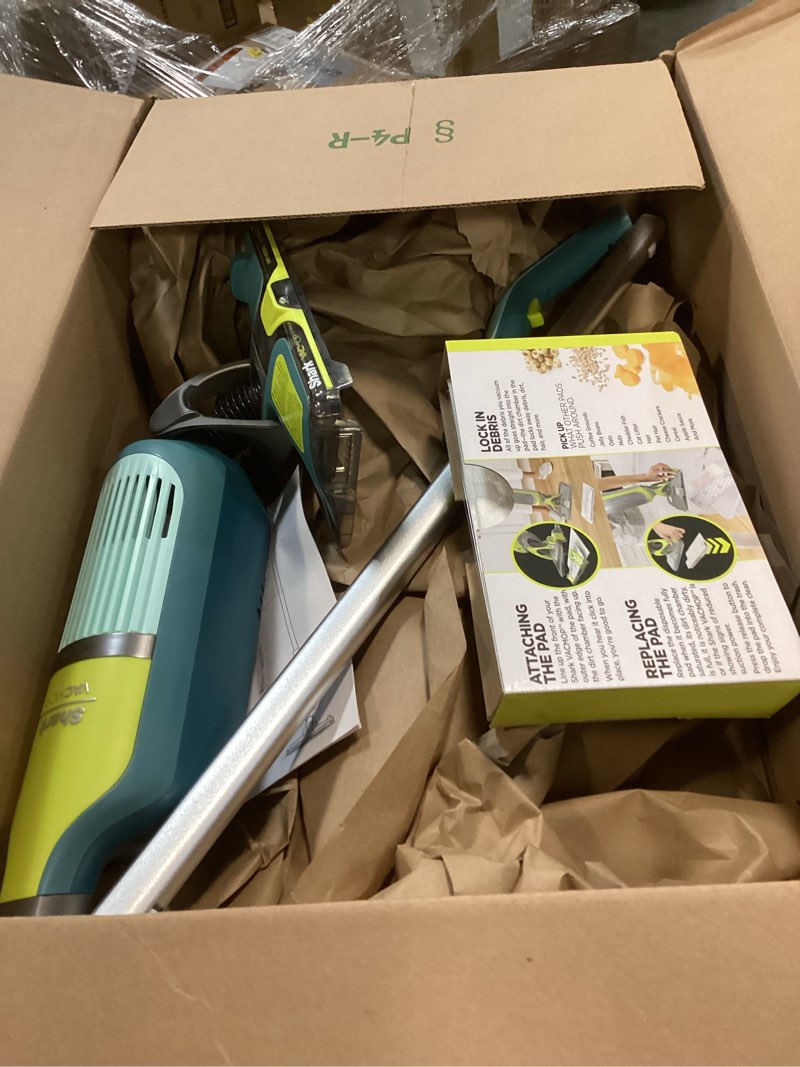 Condition photo showing As Is for Shark VACMOP Reveal New Cordless Hard Floor Cleaner, Vacuum & Spray Mop, Powerful Suction, Lightweight, Illumination Light, Includes 4 Disposable Pads, 12oz Pet Multi-Surface Cleaning Solution, VM401 New Vacmop Reveal With 4 Pads