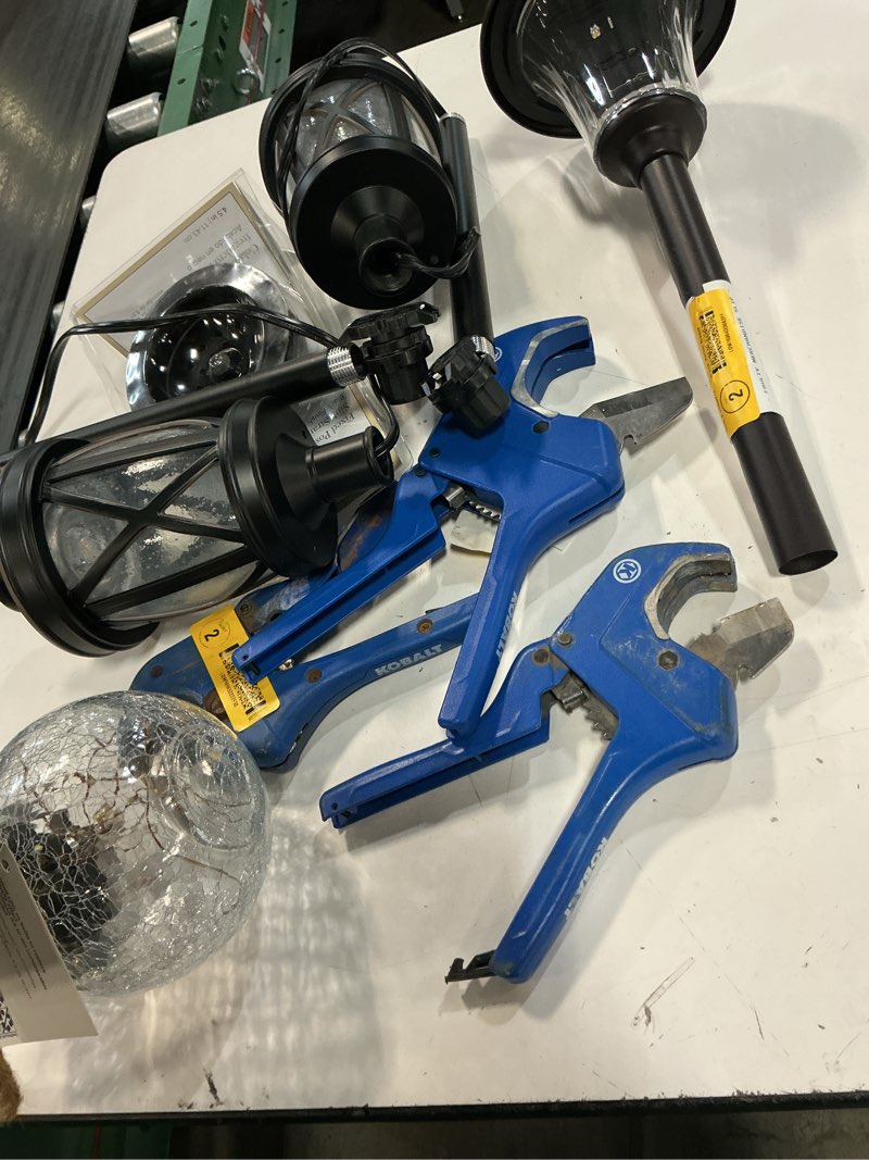Condition photo showing As Is for assorted home improvement lot (small tools, screw, home accessories, etc.