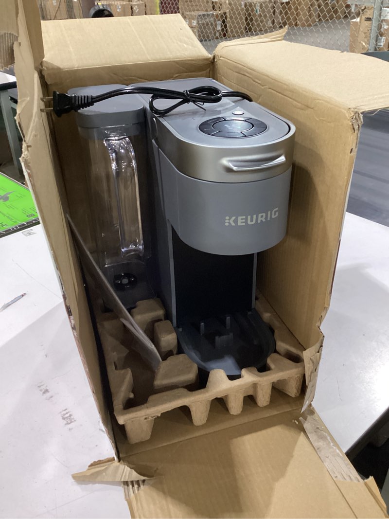 Condition photo showing As Is for keurig k-supreme single serve k-cup pod coffee maker, multistream technology, 4 brew sizes, 66oz dual-position removable reservoir, gray gray coffee maker