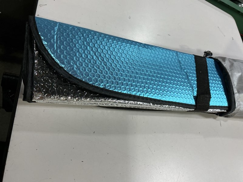 Condition photo showing Good Condition for (similar)reversible reflective windshield sun shade in teal & silver