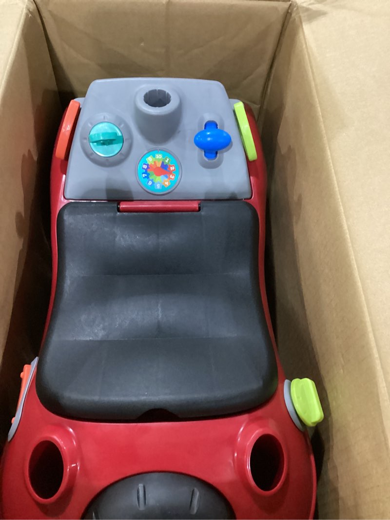 Condition photo showing As Is for incomplete radio flyer busy buggy, for toddlers 1-3, 3-in-1 push walker ride on car with 17 sensory activities, anti-tip feature, under-seat storage, horn and gears, 42 lb capacity, toddler ride on toys red