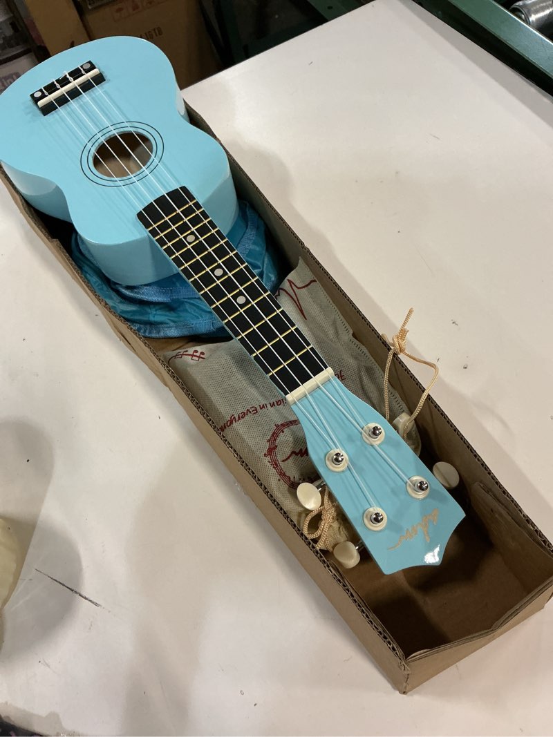 Condition photo showing Good Condition for ADM Ukulele for Beginners Hawaiian Wood Ukelele Kit for Kids Adult Student Starter Professional Ukalelee Pack Bundle with Free Lessons Gig Bag Strap Nylon String Tuner (Blue, 21 Inch)