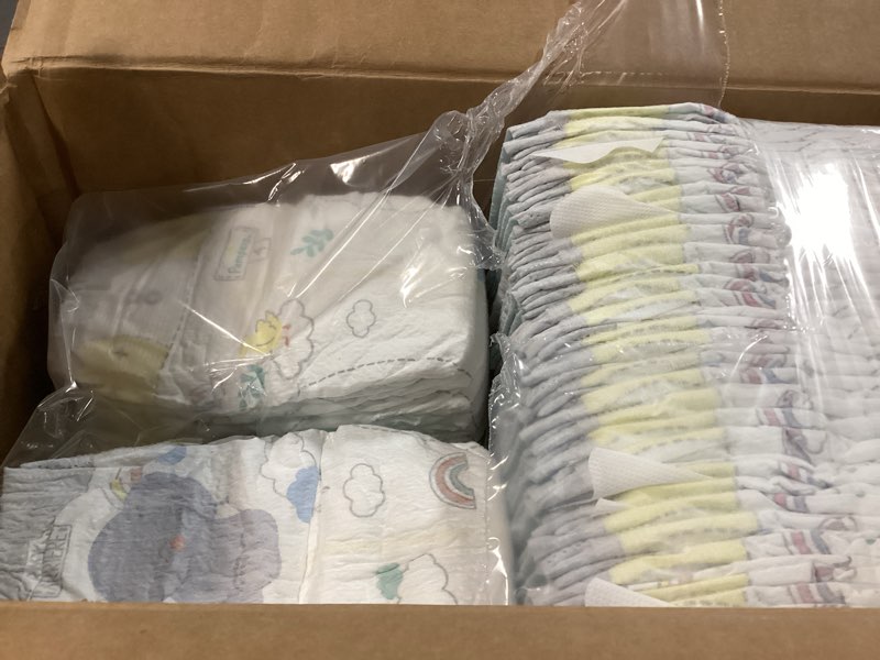 Condition photo showing As Is for pampers swaddlers diapers, size 4 (15-34 lbs), 120 count, absorbent, keeps baby dry and comfortable, skin safe disposable baby diaper (packaging may vary) size 4 120