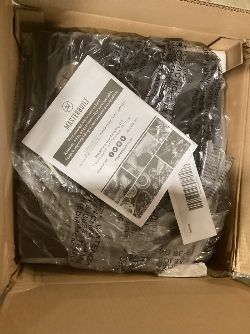 Condition photo showing New/Like New for Masterbuilt® 30-inch Digital Electric Vertical BBQ Smoker with Side Wood Chip Loader, Chrome Racks and 710 Cooking Square Inches in Black, Model MB20071117 30" No Window