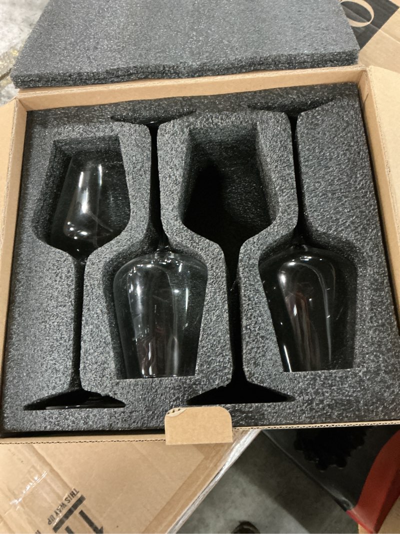 Condition photo showing As Is for mouth blown red wine glass