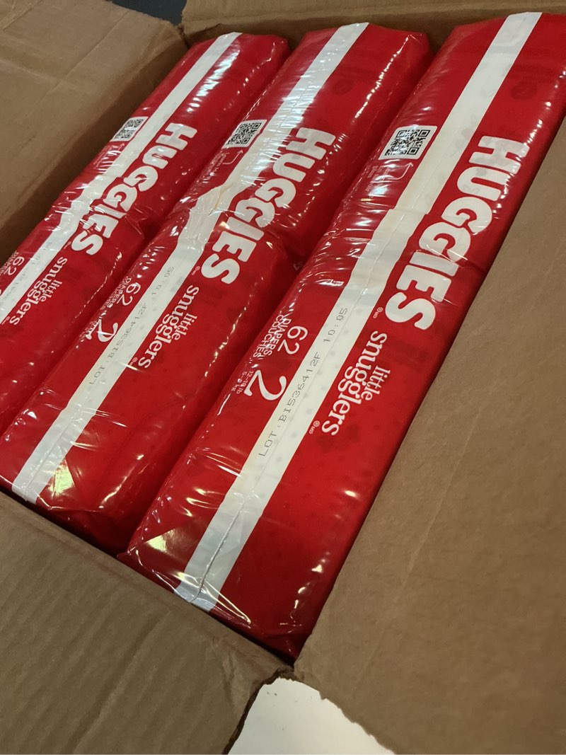Condition photo showing New/Like New for huggies size 2 diapers, little snugglers baby diapers, size 2 (12-18 lbs), 186 count (3 packs of 62), packaging may vary size 2 186