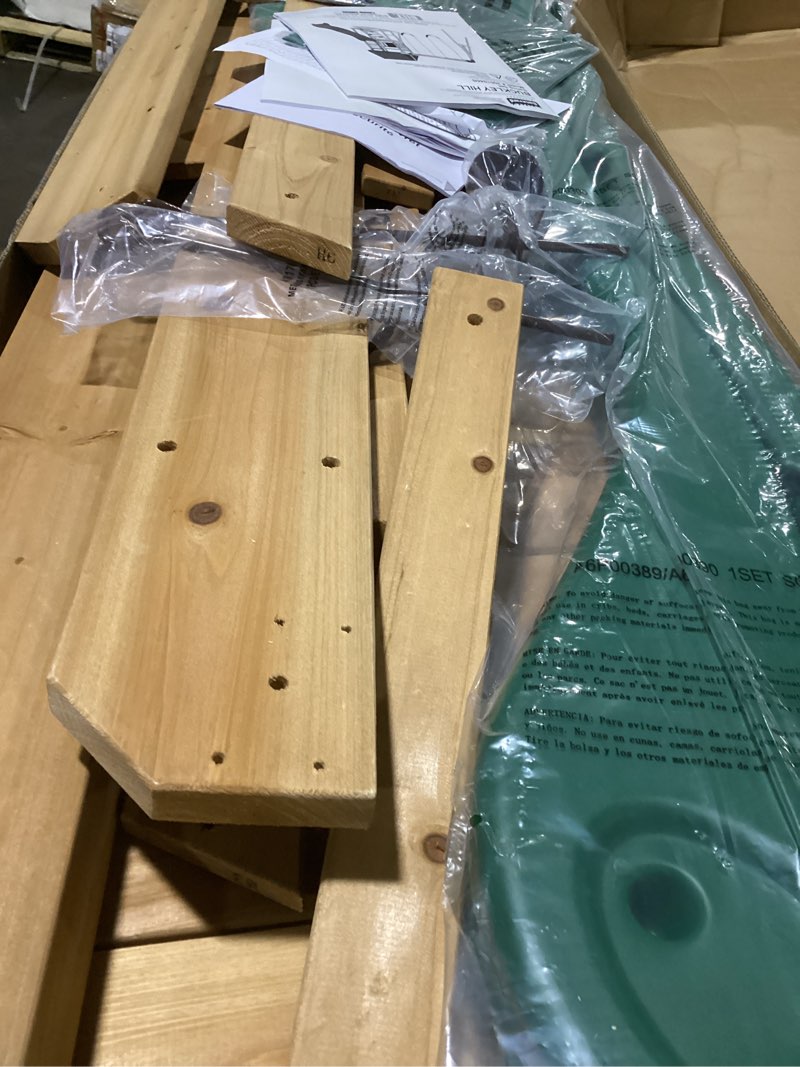 Condition photo showing Good Condition for backyard discovery buckley hill cedar wood swing set with wave slide, play deck, rock wall ladder, belt swings, chalkboard, canopy roof, outdoor playset