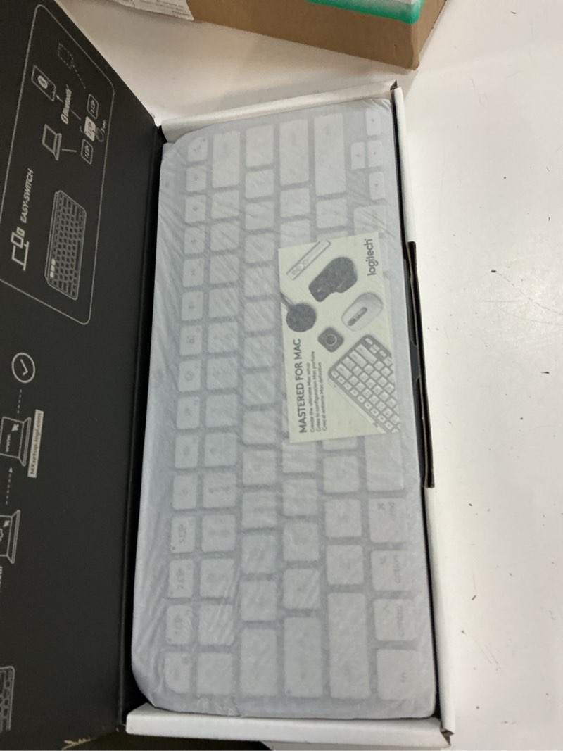 Condition photo showing New/Like New for logitech mx keys mini for mac minimalist wireless keyboard, compact, bluetooth, backlit keys, usb-c, tactile typing, compatible with macbook pro,macbook air,imac,ipad - pale grey keyboard compact pale grey