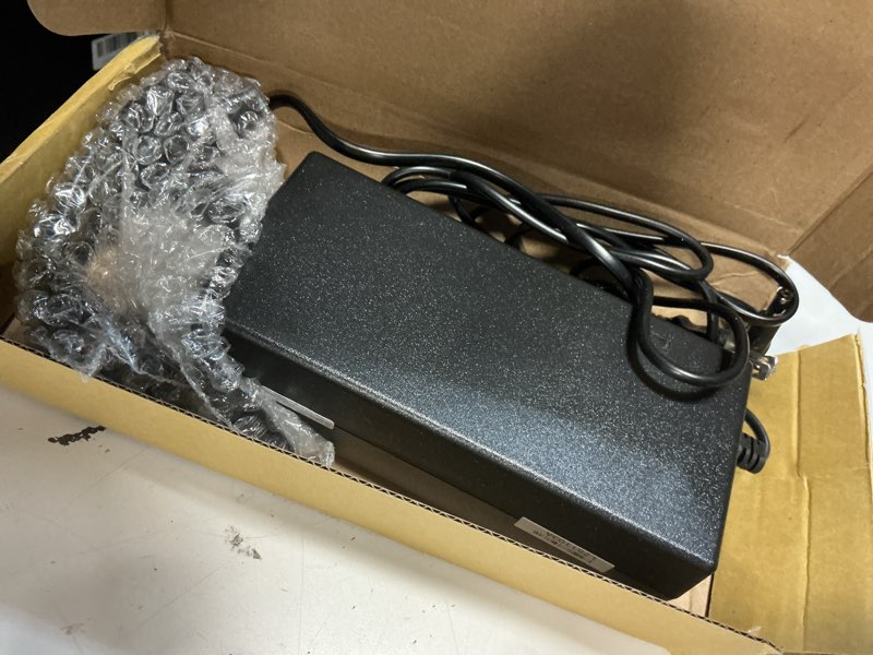 Condition photo showing As Is for fancy buying 7-in-1 universal 54.6v 2a ebike charger for 48v fast and safe charging of 13s li-ion battery