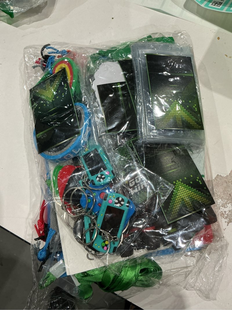 Condition photo showing Good Condition for video game party favors, 124 pcs gaming birthday party supplies with drawstring bags vip pass tickets silicone bracelet keychain temporary tattoo stickers game theme goodie bag for kids gamer