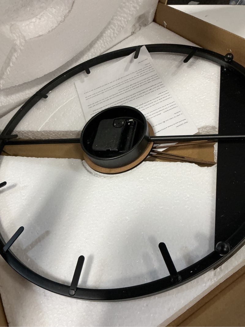 Condition photo showing Good Condition for 16 inch wall clock, modern decorative clock with walnut wood dial, silent non-ticking battery operated black metal frame for living room, kitchen, office, or bedroom wall decor, black and brown modern wood accent 16 inch
