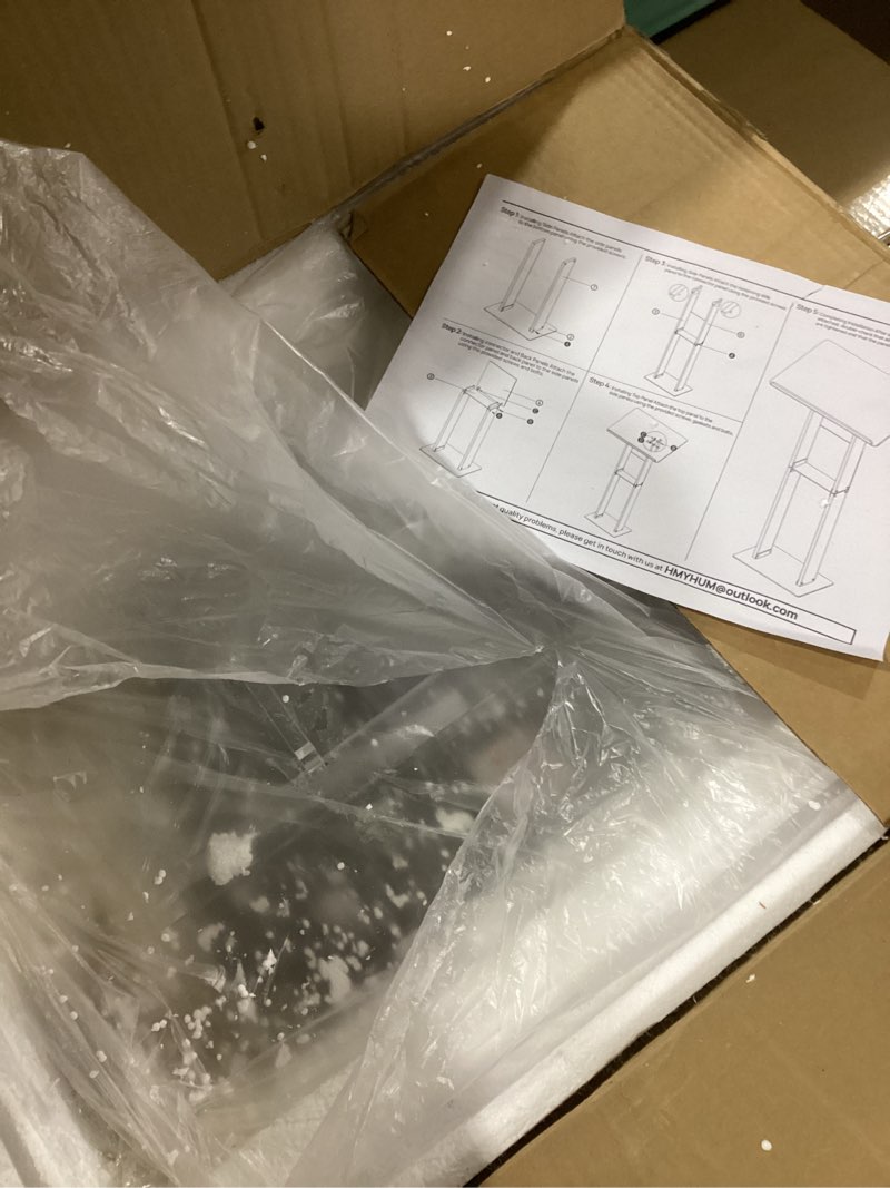 Condition photo showing Good Condition for HMYHUM Acrylic Podium Stand, Clear Lecterns & Pulpits for Classroom, Weddings, Churches, Speech, with Storage Shelf, Metal Base, 23.6" L x 15.7" W x 46.1" H, Modern