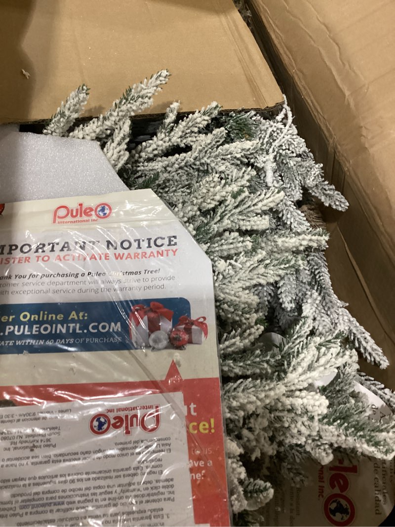 Condition photo showing As Is for puleo international 4.5ft pre-lit potted flocked arctic fir christmas tree with 70 clear lights, 419 realistic dense snow flocked branch tips, easy setup artificial trees with sturdy stand 4.5' flocked arctic fir with 70 clear lights