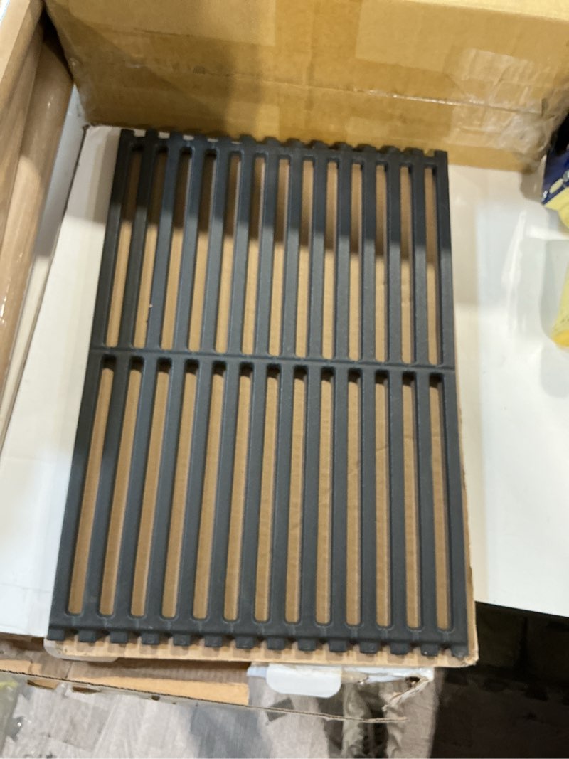 Condition photo showing As Is for preseasoned cast iron cooking grates for spirit 310/320 and genesis b/c gas grills (set of 2) old version