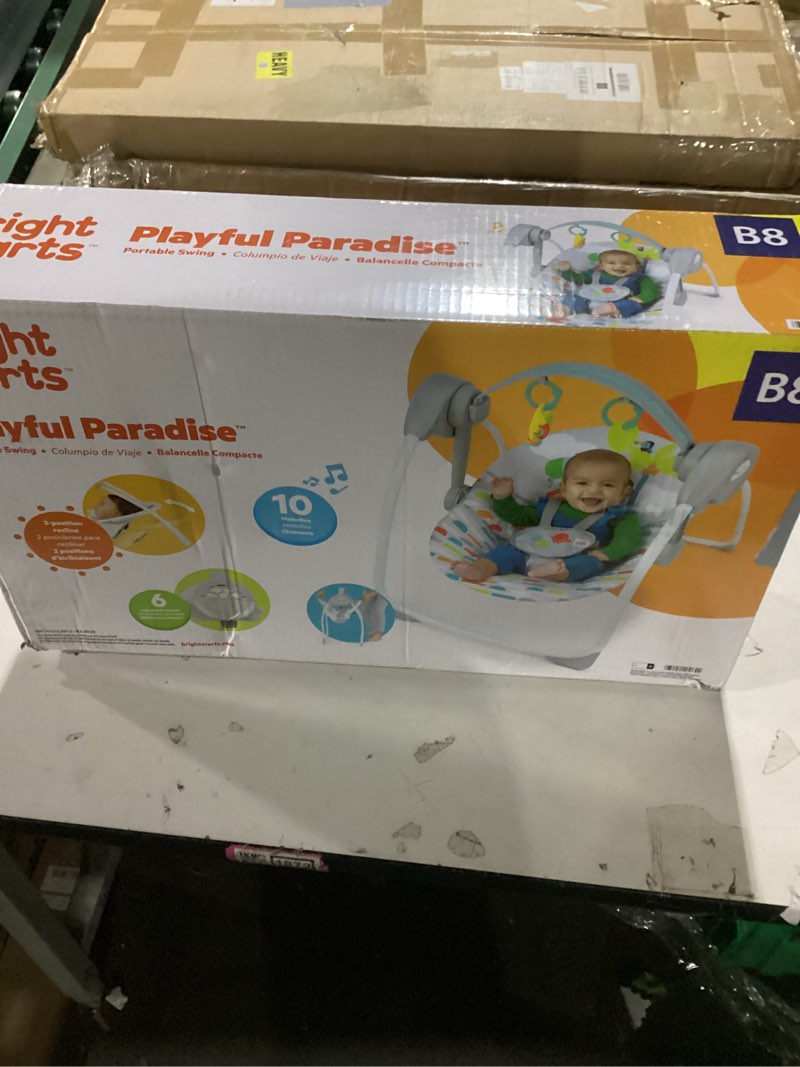 Condition photo showing New/Like New for bright starts playful paradise portable compact automatic baby swing with music, unisex, newborn +