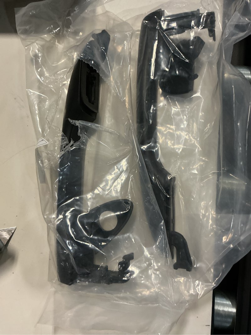 Condition photo showing As Is for a-premium outside exterior door handles compatible with kia sedona 2015-2021 without smart entry system, primed black, 2-pc set, front driver and passenger side