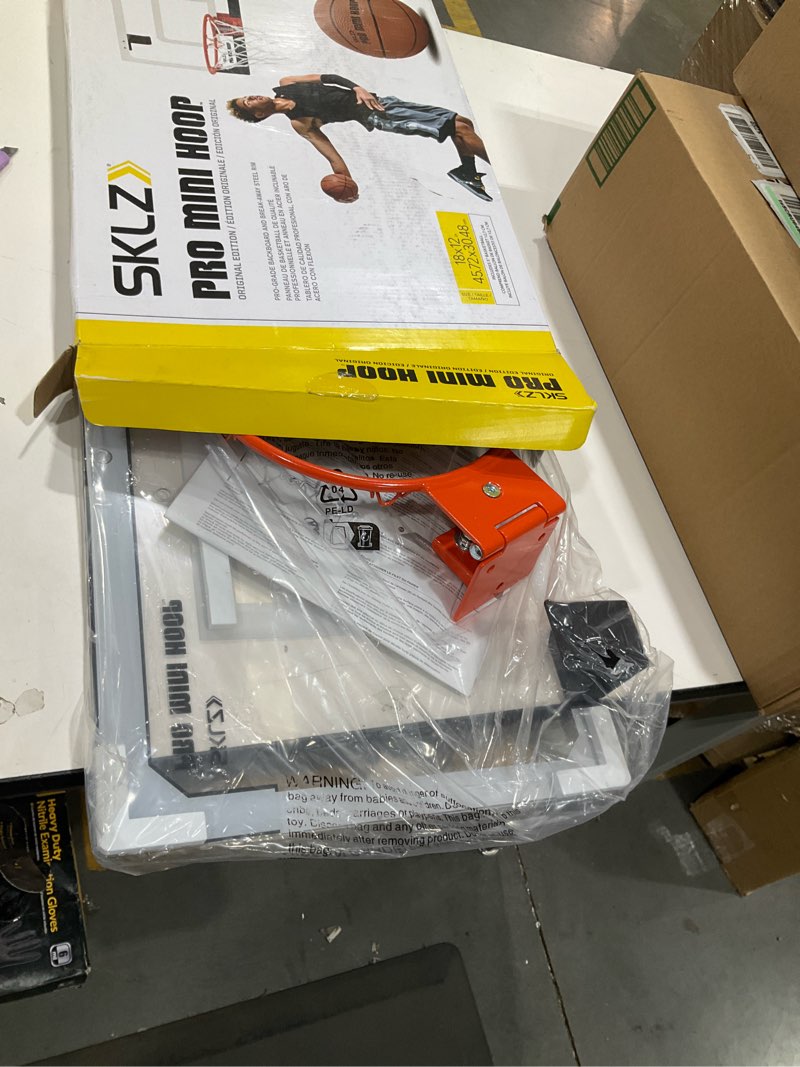 Condition photo showing Good Condition for sklz pro mini indoor basketball hoop with ball, over the door, shatter-proof backboard, spring-action break-away steel rim, great for home, dorm room, and office standard
