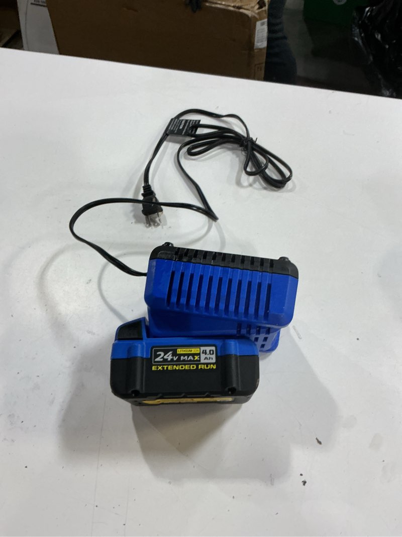 Condition photo showing As Is for Kobalt 24v max 4.0 Ah ectended run lithium ion battery with charging dock
