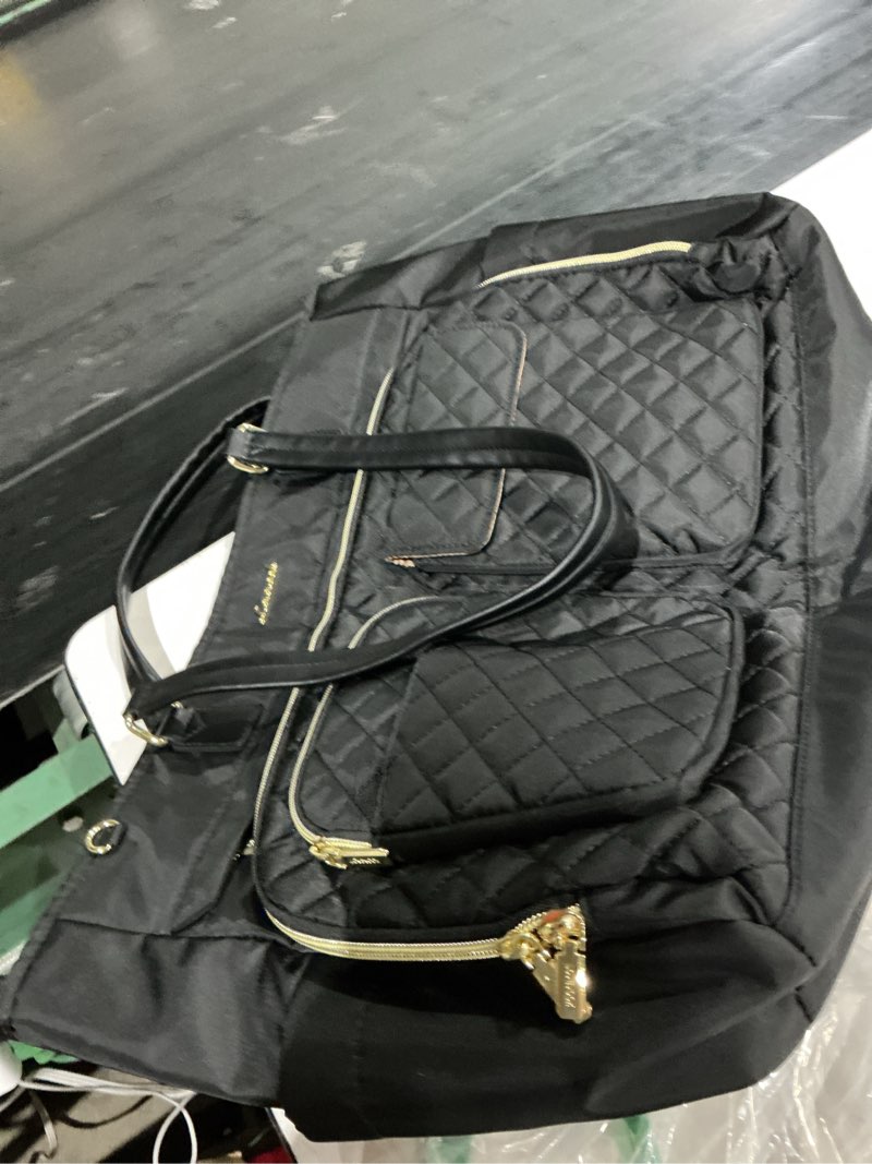 Condition photo showing Good Condition for lovevook tote bag, work bags for women with large cup holder, large capacity teacher tote with multi pockets, water resistant nurse diaper tote with padded laptop compartment, 17.3 inch black