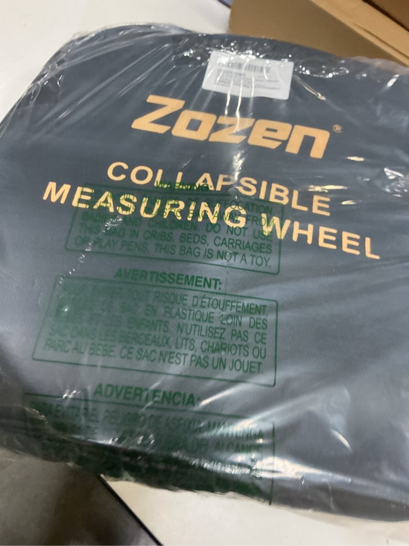 Condition photo showing Good Condition for zozen distance measuring wheel, measure wheel in feet and inches, collapsible/mechanical/one key to reset/kickstand to keep stand/starting point arrow and carrying bag, adapt to various roads.