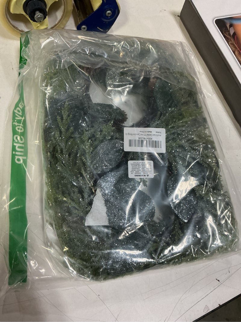 Condition photo showing New/Like New for Winlyn 4 Pcs Frosted Artificial Pine Candle Rings Christmas Candle Holder Rings Small Faux Pine Wreaths with Pinecones and Green Leaves 11.8" for Farmhouse Holiday Winter Mantel Kitchen Cabinet Décor