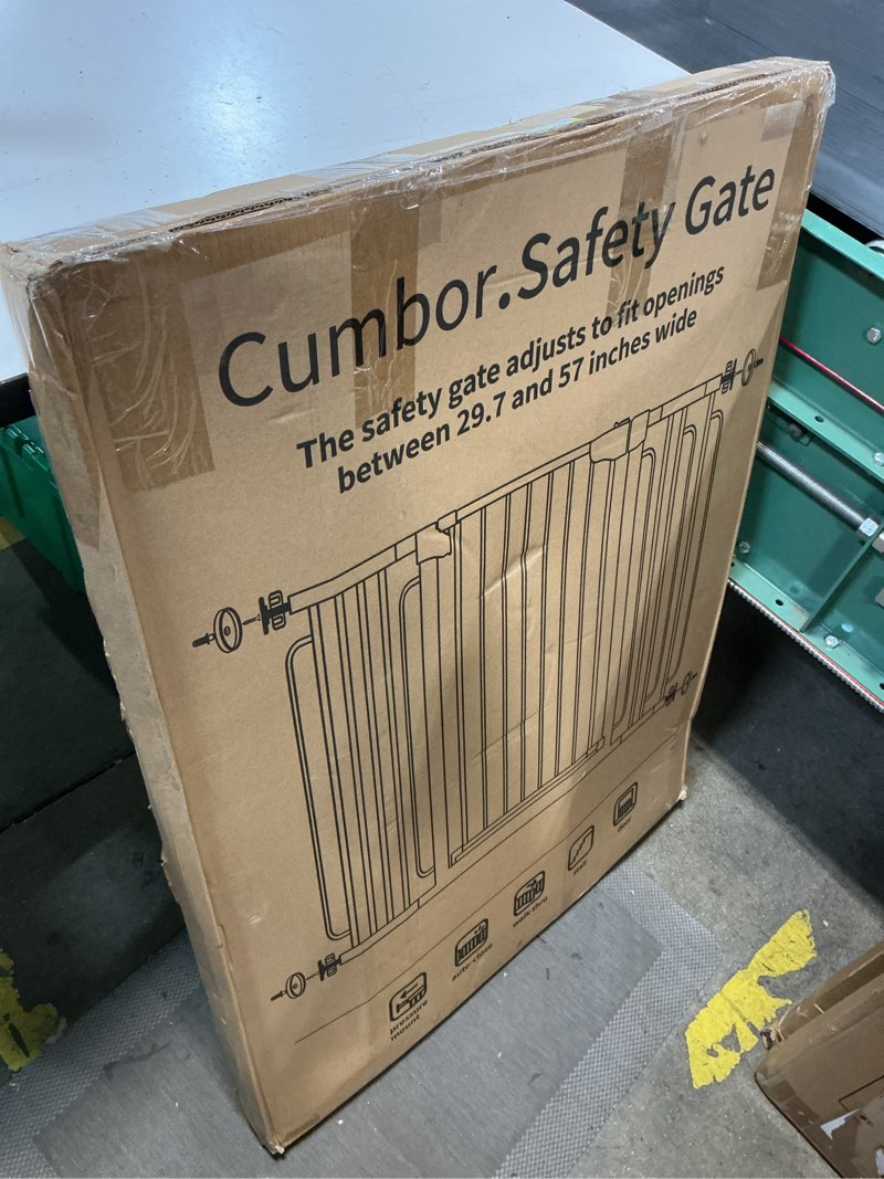 Condition photo showing New/Like New for cumbor safety gate the safety gate adjusts to fit openings between 29.7 and 57 inches wide