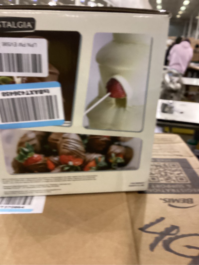 Condition photo showing New/Like New for Nostalgia 3 Tier Electric Chocolate Fondue Fountain Machine for Parties - Melts Cheese, Queso, Candy, and Liqueur - Dip Strawberries, Apple Wedges, Vegetables, and More - 24-Ounce - Black, Small