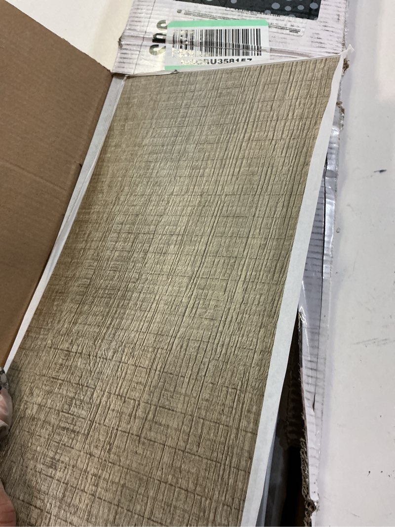 Condition photo showing Good Condition for inmozata peel and stick floor tile vinyl flooring, waterproof plank flooring 36-pack 54 sq.ft wood grain self adhesive peel and stick flooring for bedroom, living room, kitchen, rv(aged-wood) 36 x 6 inches aged wood 36