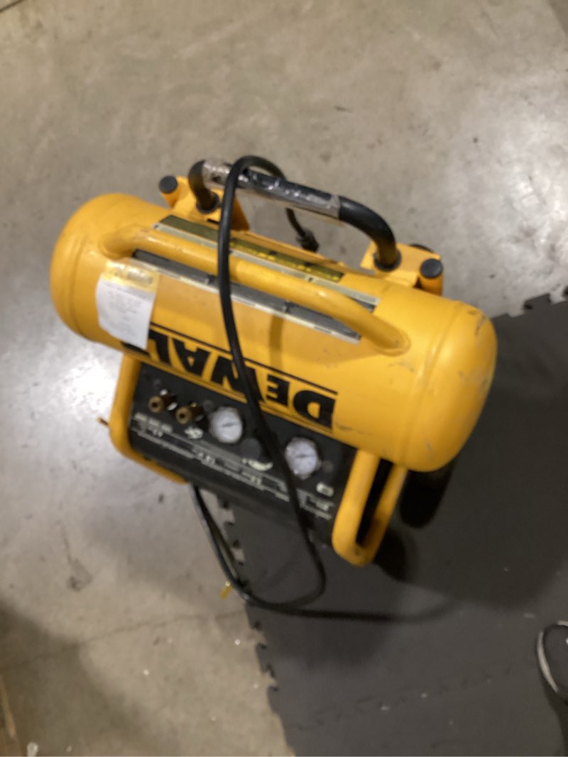Condition photo showing As Is for dewalt air compressor