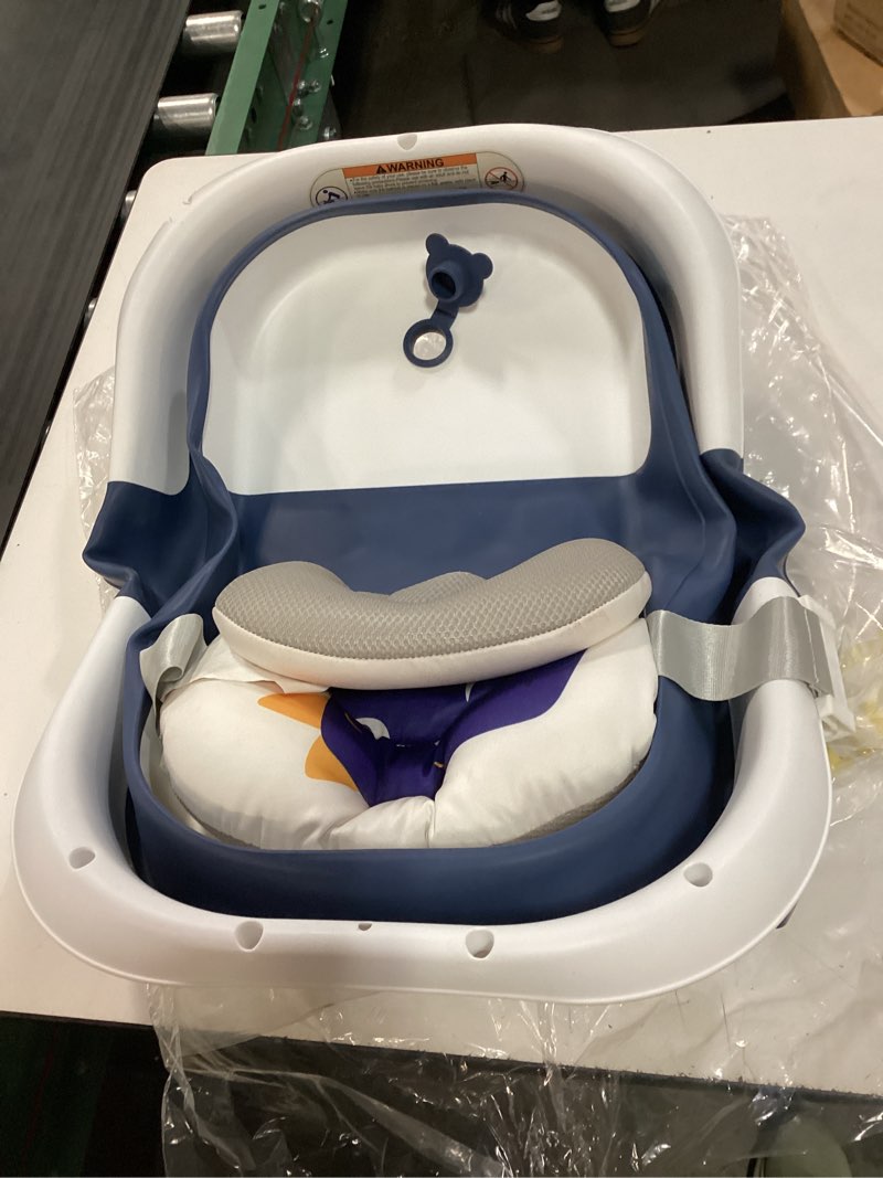 Condition photo showing As Is for morefeel collapsible baby bathtub for newborn with thermometer & 1 hooded towel & 1 soft floating cushion,portable travel bathtub with drain hole, durable foldable baby tubs for infants to toddler alligator like navy blue