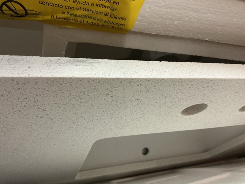 Condition photo showing As Is for allen + roth meridian 49-in x 22-in white/polished engineered marble undermount single sink 3-hole bathroom vanity top