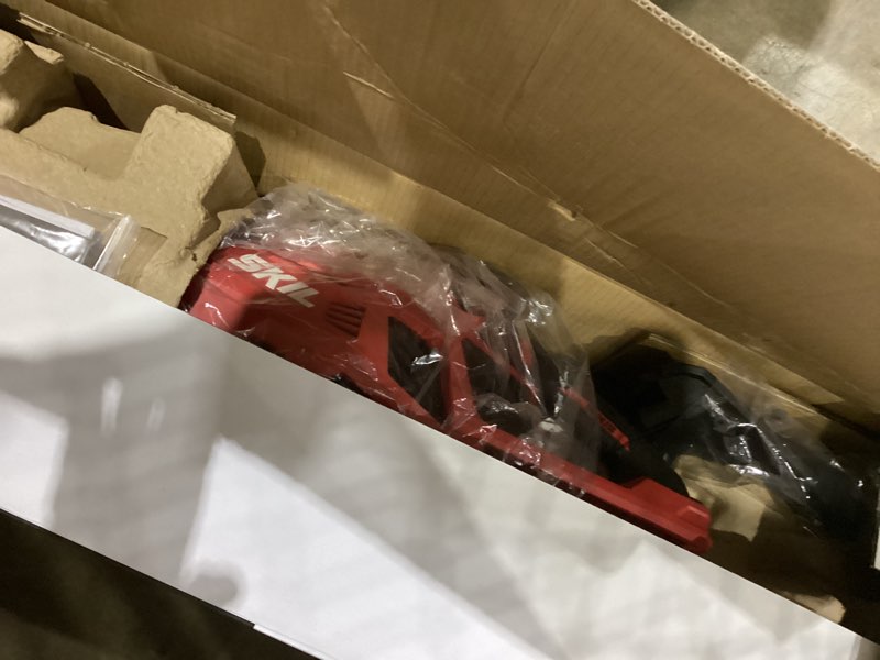 Condition photo showing As Is for SKIL CB7478C-11 PWR CORE 40 Brushless 40V 14" String Trimmer and Leaf Blower Combo Kit with 2.5Ah Battery and Charger