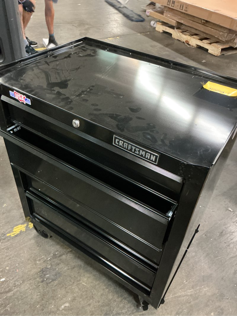 Condition photo showing As Is for craftsman 1000 series 26.5-in w x 32.5-in h 4-drawer steel rolling tool cabinet (black)