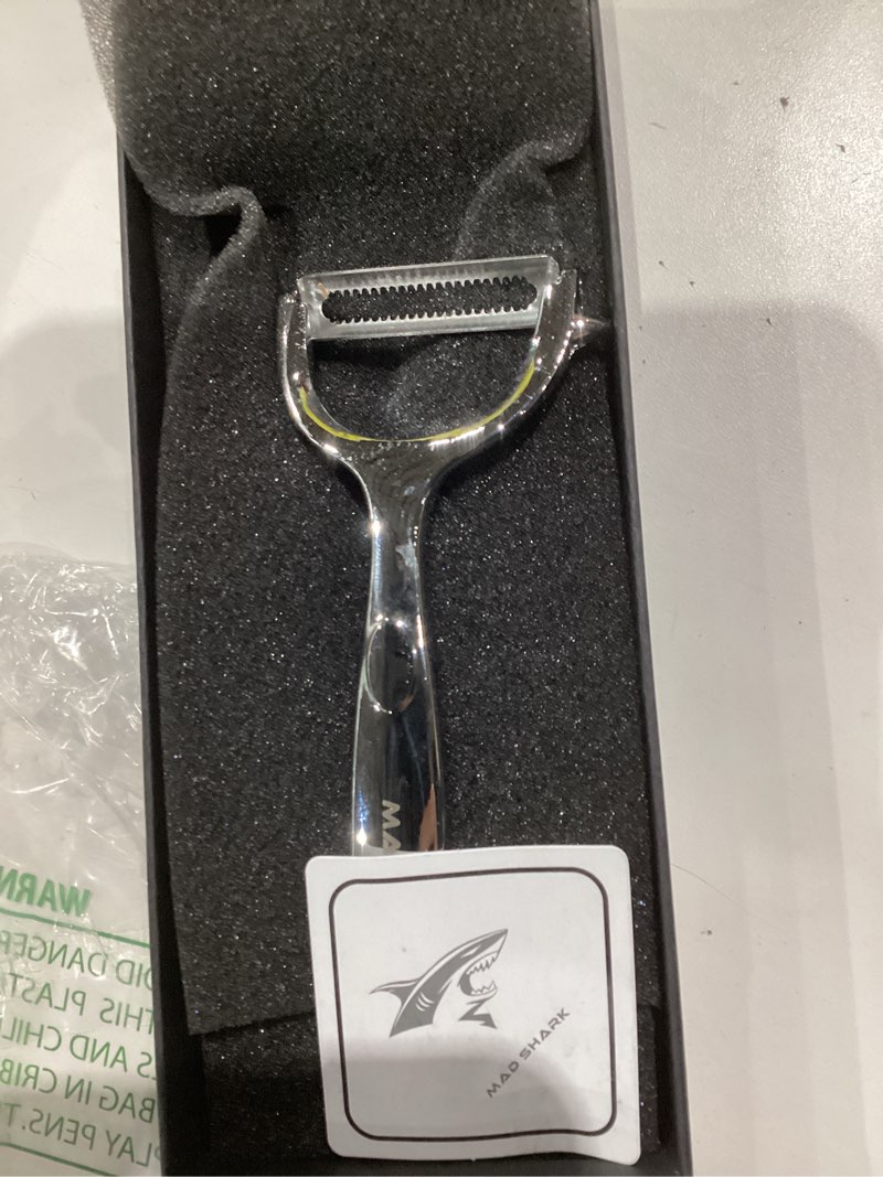 Condition photo showing As Is for mad shark ultra sharp vegetable peelers for kitchen 10 years no rust stainless steel serrated potato peeler easy to use y peeler with durable non-slip ergonomic grips for carrots, fruits, veggie sliver