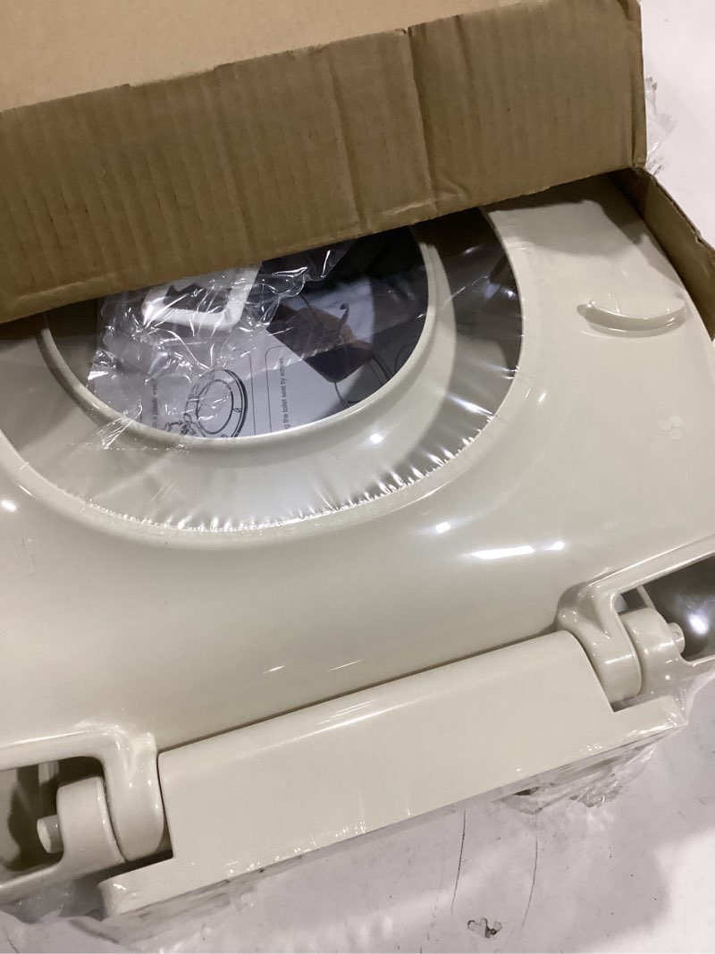 Condition photo showing New/Like New for Toilet Seat, Elongated Toilet Seat with Toddler Seat Built in, Potty Training Toilet Seat Elongated Fits Both Adult and Child, with Slow Close and Magnets- Elongated Almond Almond Elongated With Toddler Seat