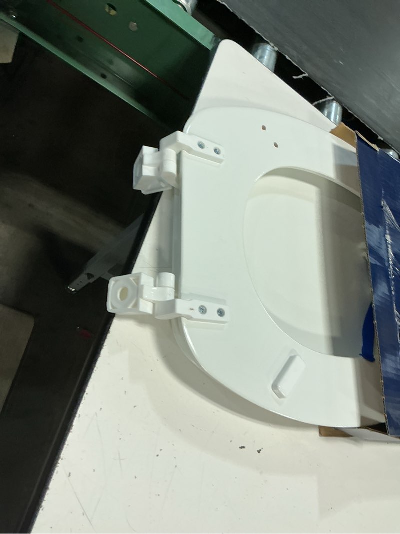 Condition photo showing As Is for project source wood white elongated toilet seat