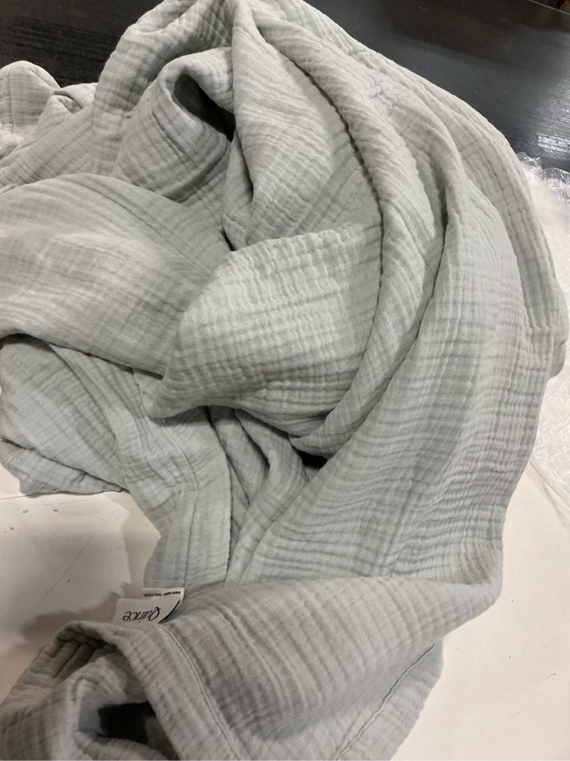 Condition photo showing As Is for organic cotton gauze blanket, king/cal king, mist