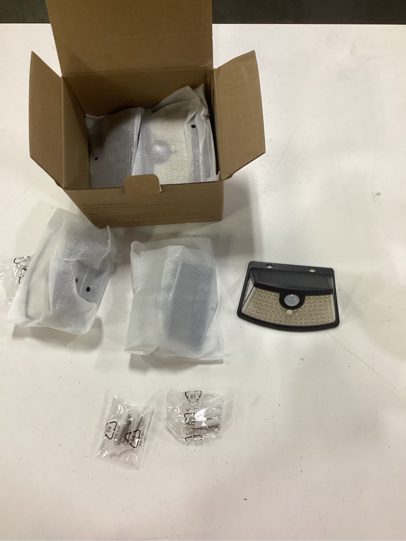 Condition photo showing New/Like New for aootek new solar motion sensor lights 120 leds with lights reflector,270° wide angle, ip65 waterproof, step lights for front door, yard, garage, deck (black, daylight white, 6-pack) black shell-daylight white 6 pack