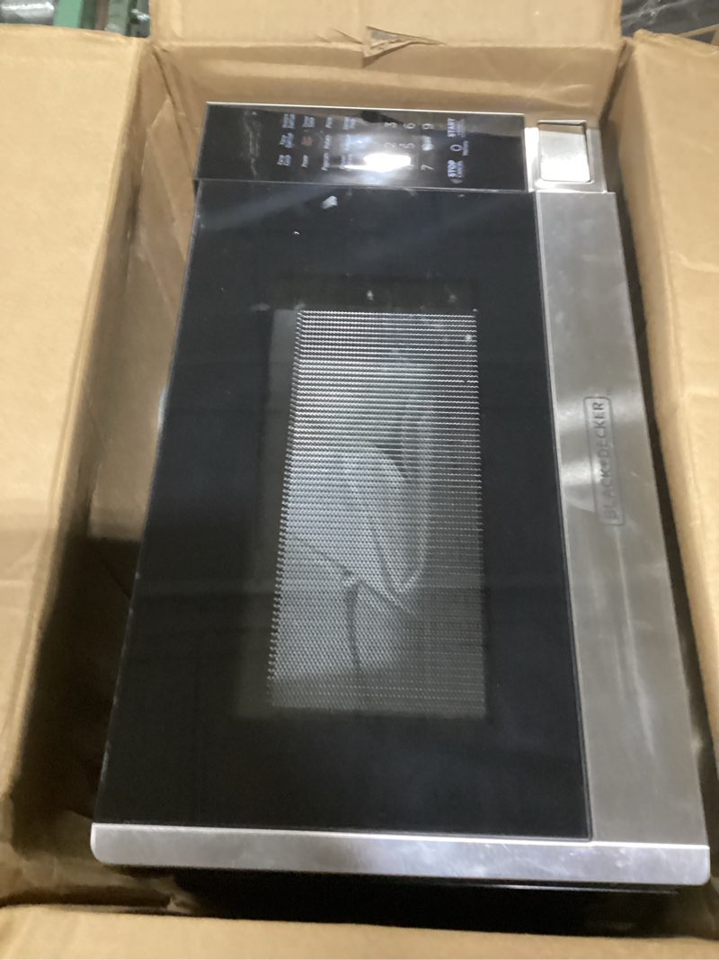 Condition photo showing As Is for BLACK+DECKER Digital Microwave Oven with Turntable Push-Button Door, Child Safety Lock, Stainless Steel, 0.9 Cu Ft 0.9 Cu.Ft