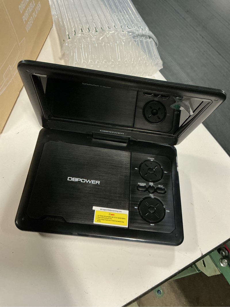 Condition photo showing Good Condition for dbpower 11.5" portable dvd player, 5-hour built-in rechargeable battery, 9" swivel screen, support cd/dvd/sd card/usb, remote control, 1.8 meter car charger, power adaptor and car headrest (black)