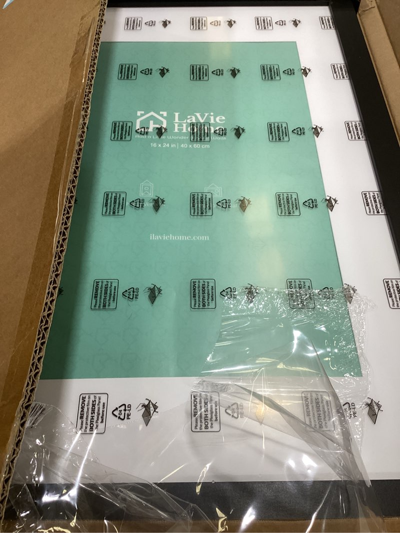 Condition photo showing Good Condition for LaVie Home 16 x 24 Picture Frame Black Poster Frame,Display Pictures 12x18 with Mat or 16x24 Without Mat, Stable and Sturdy Frame and Polished Plexiglass, Suitable for wall decoration?1 Pack? 16x24 Black