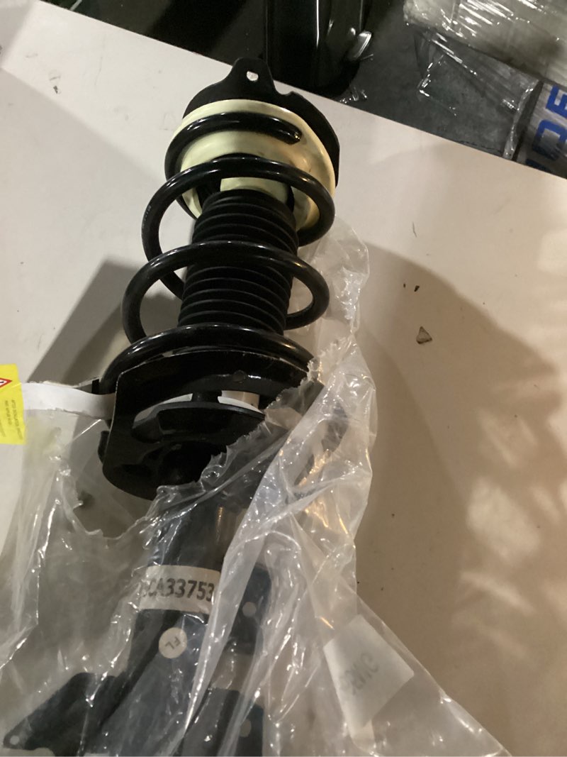Condition photo showing New/Like New for Monroe Quick-Strut 172264 Suspension Strut and Coil Spring Assembly for Mazda 3