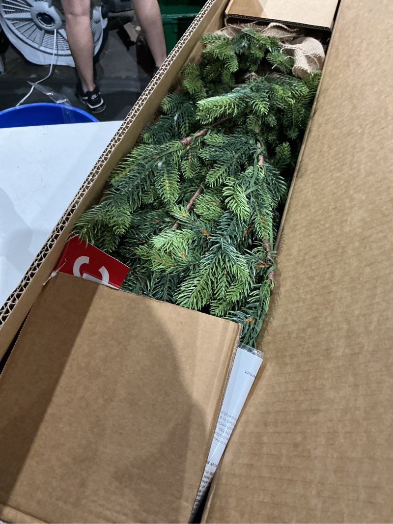 Condition photo showing As Is for nearly natural 6ft. fraser fir natural look artificial christmas tree with 250 clear led lights, a burlap base and 1243 bendable branches