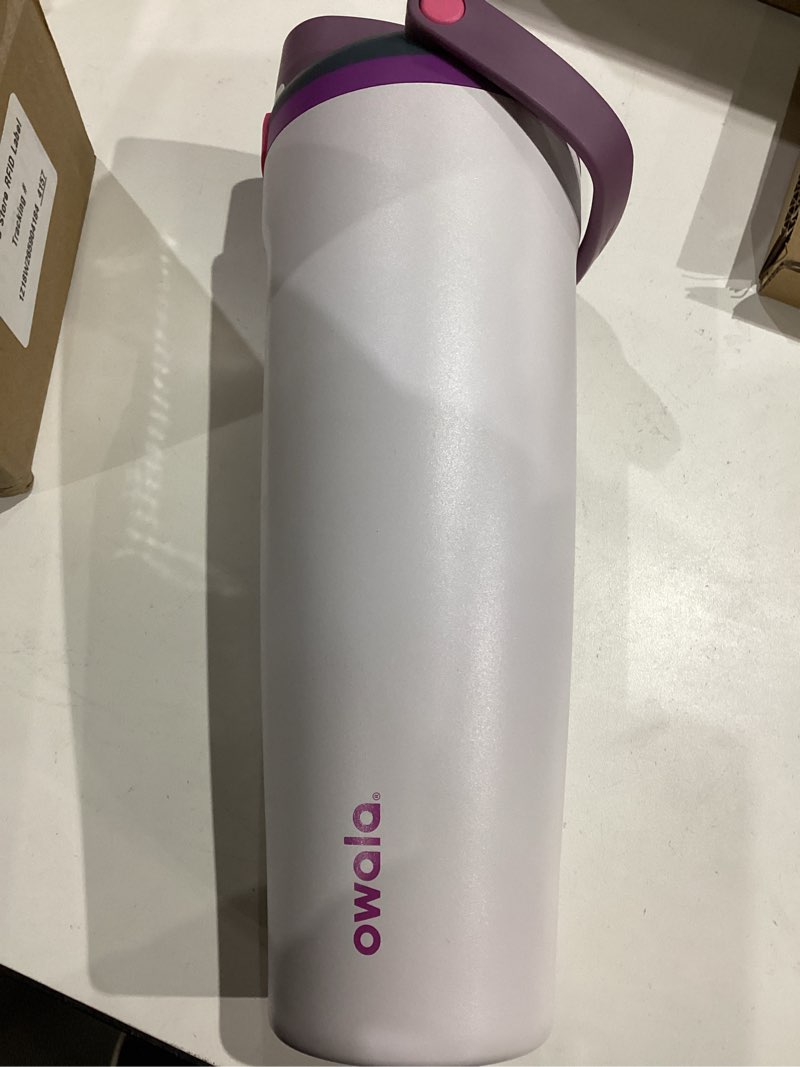 Condition photo showing Good Condition for Owala FreeSip Sway Insulated Stainless Steel Water Bottle with Two-Way Spout, Built-In Straw and Bucket Handle, Made for Travel, School, and Sports, 40oz, BPA Free, Leak Proof, Dreamy Field Dreamy Field 40 Ounces