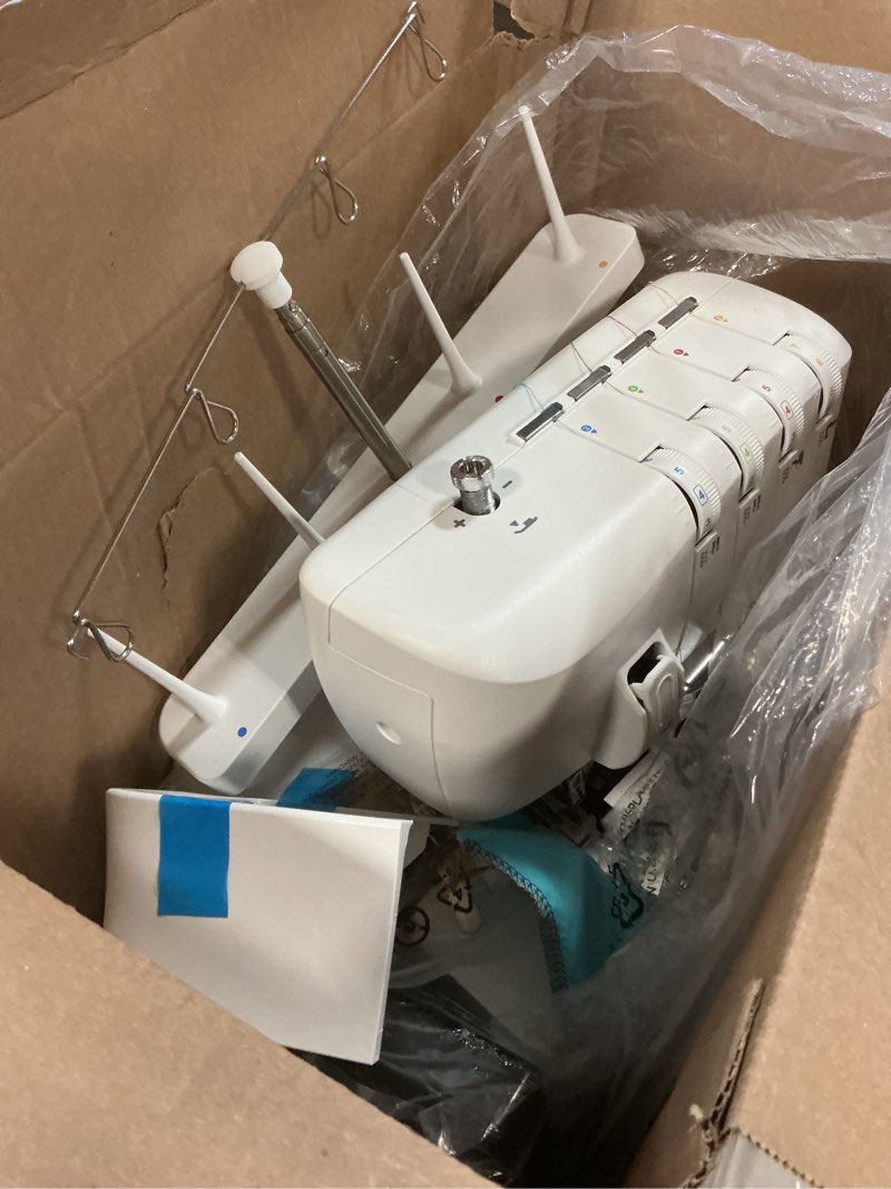 Condition photo showing As Is for singer s14-78 serger with accessory kit | overlock machine with 2-3-4 stitch capability, 1200 stitches/minute, differential feed, led light & free arm, white