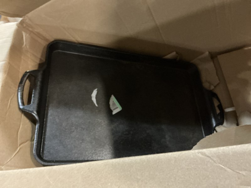 Condition photo showing As Is for Lodge Cast Iron Baking Pan